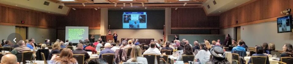 Dr. Nanette Odell leading a presentation at an ADA conference