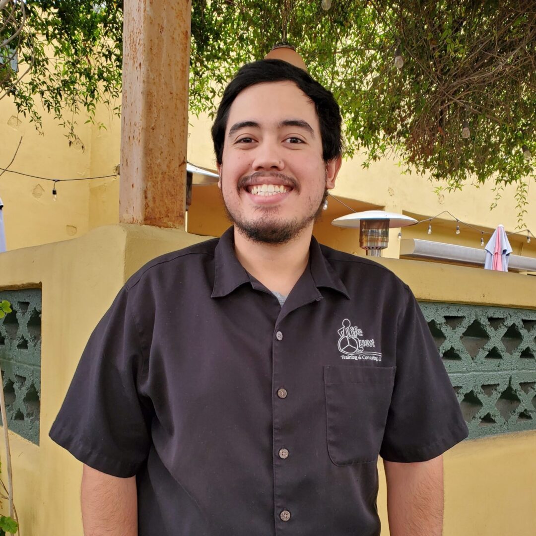 Portrait photograph of Ricky Rivera.